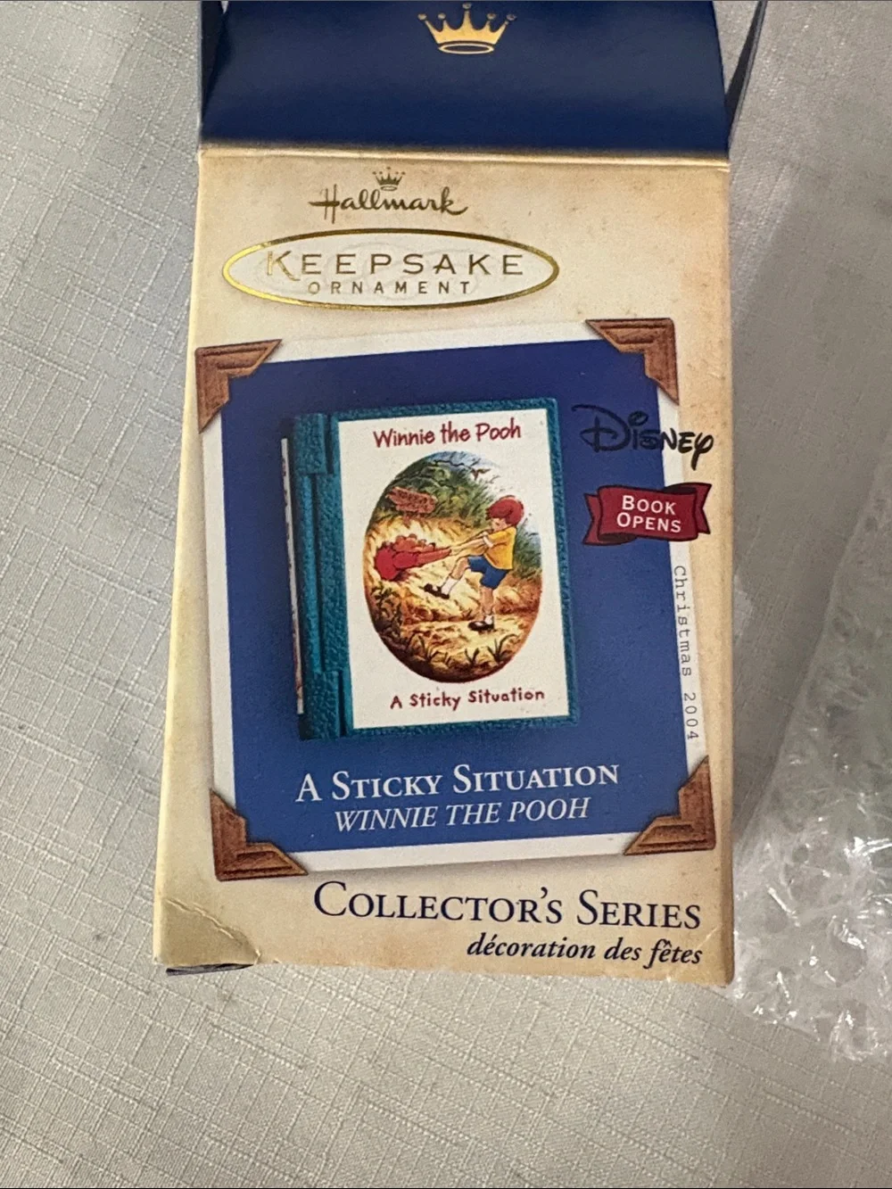 Hallmark Teal and Yellow Winnie the Pooh Mini Book Ornament 2004 NIB